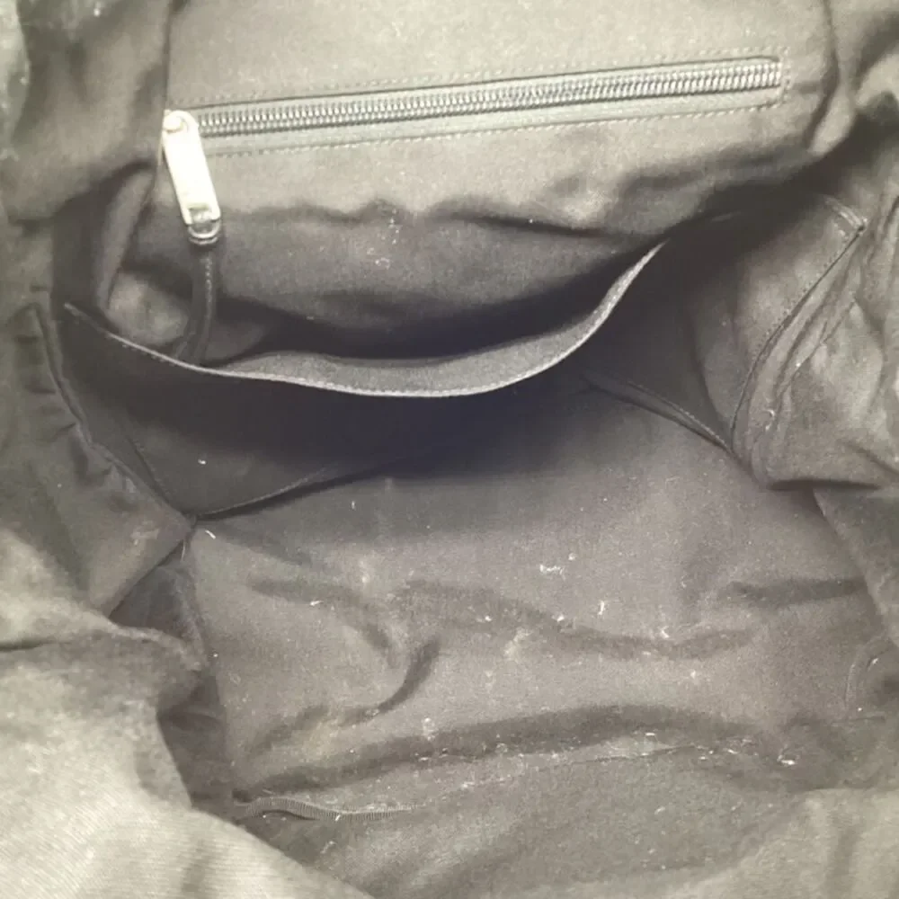 Saint Laurent Noe Patched Backpack in Black Cotton